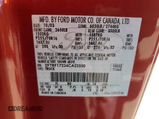 2004 Ford F-150 XL with VIN 2FTRF17234CA23550, listed as a Copart auction lot 60475835 with 290,842 mi miles and Salvage title. Bid and sale history available at DreamBid. Image 12.