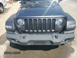 2020 Jeep Wrangler Unlimited Black and Tan with VIN 1C4HJXDGXLW221705, listed as a Copart auction lot 56224785 with 82,360 mi miles and Salvage title. Bid and sale history available at DreamBid. Image 12.