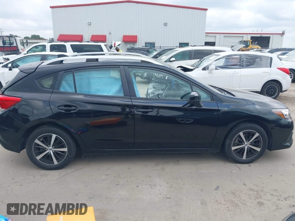 2021 Subaru Impreza Premium z VIN 4S3GTAD64M3707682, wystawiony jako IAAI lot #42142820 z przebiegiem 44 819 mil mil oraz . Historia ofert i sprzedaży dostępna na DreamBid. Obrazek 13.