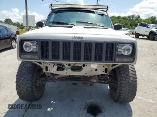 2000 Jeep Cherokee SE with VIN 1J4FF28SXYL140930, listed as a Copart auction lot 59191035 with 248,598 mi miles and Salvage title. Bid and sale history available at DreamBid. Image 5.