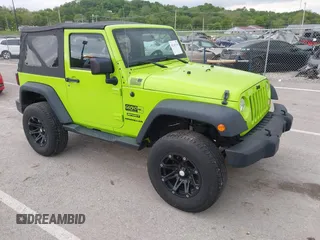 2013 Jeep Wrangler Sport with VIN 1C4AJWAG8DL507944, listed as a IAAI auction lot 42143144 with 70,085 mi miles and . Bid and sale history available at carsss.com. Image 1.