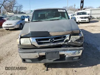1999 Mazda B-Series 2WD Truck SX with VIN 4F4YR12C5XTM24067, listed as a Copart auction lot 85241964 with 219,030 mi miles and Salvage Title. Bid and sale history available at carsss.com. Image 5.