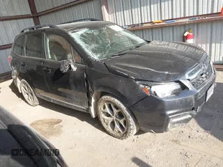 2017 Subaru Forester Touring with VIN JF2SJAWC6HH466379, listed as a IAAI auction lot 42031728 with 140,020 mi miles and . Bid and sale history available at DreamBid. Image 1.