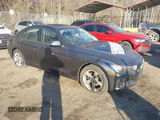 2015 BMW 3 Series 328i xDrive with VIN WBA3B5G55FNS19437, listed as a IAAI auction lot 41765832 with 137,993 mi miles. Bid and sale history available at carsss.com. Image 1.