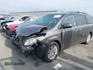 2015 Toyota Sienna XLE with VIN 5TDYK3DC6FS660410, listed as a IAAI auction lot 41801496 with 81,755 mi miles. Bid and sale history available at carsss.com. Image 2.