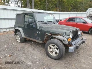 2005 Jeep Wrangler X with VIN 1J4FA39S65P319487, listed as a Copart auction lot 71848394 with 161,574 mi miles and Salvage Title. Bid and sale history available at carsss.com. Image 4.