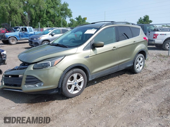 2013 Ford Escape SE with VIN 1FMCU9GX0DUA54515, listed as a IAAI auction lot 42330534 with 113,484 mi miles and . Bid and sale history available at DreamBid. Image 2.