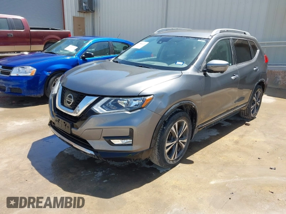 2017 Nissan Rogue SL with VIN JN8AT2MT2HW407004, listed as a IAAI auction lot 41884121 with 79,227 mi miles and . Bid and sale history available at DreamBid. Image 17.
