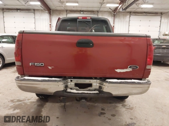 2003 Ford F-150 XL with VIN 1FTRX18L33NB82694, listed as a IAAI auction lot 41612431 with 179,664 mi miles. Bid and sale history available at carsss.com. Image 16.