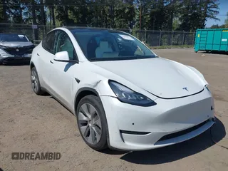 2022 Tesla Model Y Long Range z VIN 7SAYGDEE7NF418223, wystawiony jako IAAI lot #42046651 z przebiegiem 18 724 mil mil oraz . Historia ofert i sprzedaży dostępna na DreamBid. Obrazek 1.