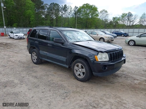 2005 Jeep Grand Cherokee Laredo with VIN 1J4GS48K65C570266, listed as a IAAI auction lot 42026624 with 162,512 mi miles. Bid and sale history available at carsss.com. Image 1.