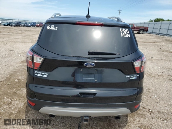 2018 Ford Escape Titanium with VIN 1FMCU9J95JUB31286, listed as a Copart auction lot 58721355 with 100,329 mi miles and Salvage title. Bid and sale history available at DreamBid. Image 6.