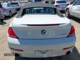 2009 BMW 6 Series 650i z VIN WBAEB53579CX64649, wystawiony jako IAAI lot #41937705 z przebiegiem 136 164 mil mil oraz . Historia ofert i sprzedaży dostępna na DreamBid. Obrazek 17.