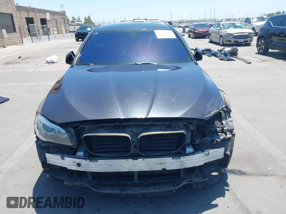 2014 BMW 5 Series 535i with VIN WBA5B1C51ED479359, listed as a IAAI auction lot 42396160 with 149,522 mi miles and . Bid and sale history available at DreamBid. Image 13.