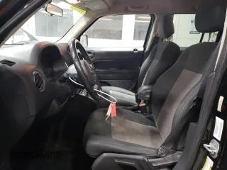 2013 Jeep Patriot Latitude with VIN 1C4NJPFA2DD255341, listed as a Copart auction lot 85511244 with 129,873 mi miles and Clean Title. Bid and sale history available at carsss.com. Image 7.
