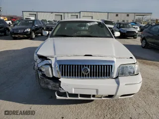 2010 Mercury Grand Marquis LS with VIN 2MEBM7FV7AX614134, listed as a Copart auction lot 48724825 with 129,960 mi miles and Salvage Title. Bid and sale history available at carsss.com. Image 5.