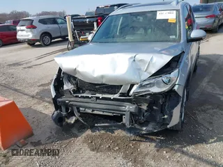 2011 Volkswagen Tiguan SE with VIN WVGBV7AX2BW562055, listed as a IAAI auction lot 41642084 with 175,407 mi miles and . Bid and sale history available at DreamBid. Image 12.
