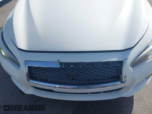 2015 Infiniti Q50 Premium z VIN JN1BV7ARXFM416349, wystawiony jako IAAI lot #42225088 z przebiegiem 194 127 mil mil oraz . Historia ofert i sprzedaży dostępna na DreamBid. Obrazek 6.