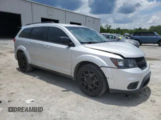 2013 Dodge Journey SXT with VIN 3C4PDCBG4DT685370, listed as a Copart auction lot 61353335 with 193,973 mi miles and Salvage title. Bid and sale history available at DreamBid. Image 4.