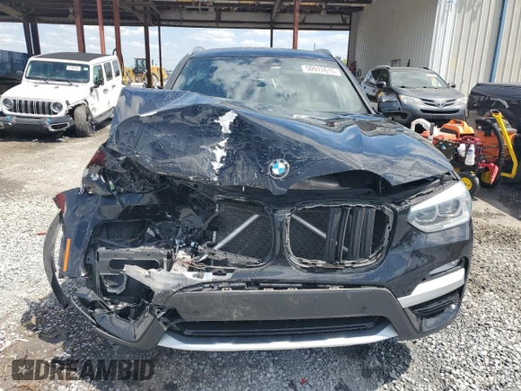 2018 BMW X3 xDrive30i with VIN 5UXTR9C52JLD69863, listed as a Copart auction lot 50917615 with 0 mi miles and Salvage Title. Bid and sale history available at carsss.com. Image 5.