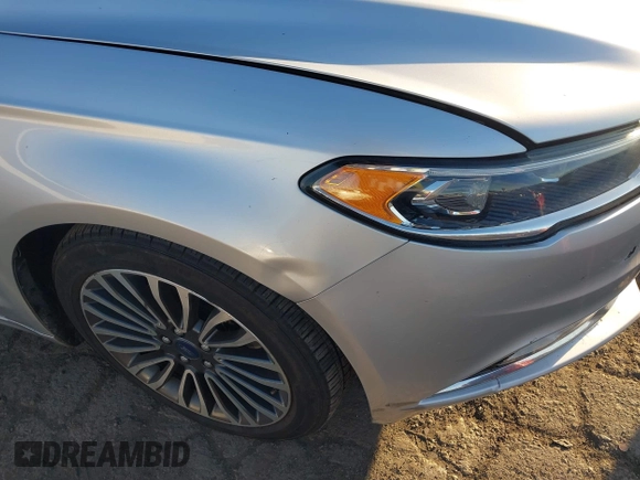 2017 Ford Fusion Hybrid Titanium with VIN 3FA6P0RU8HR190482, listed as a IAAI auction lot 41322244 with 137,539 mi miles and . Bid and sale history available at DreamBid. Image 18.