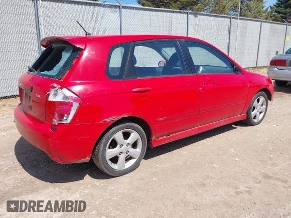 2009 Kia Spectra with VIN KNAFE241995024997, listed as a IAAI auction lot 42095812 with 217,555 mi miles. Bid and sale history available at carsss.com. Image 4.