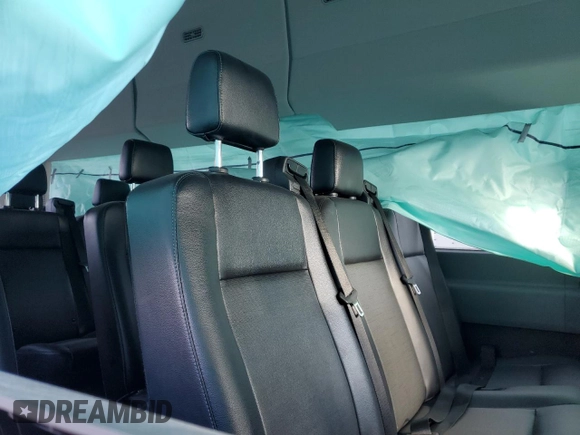 2023 Ford Transit Passenger XL with VIN 1FBVU4X89PKB82684, listed as a Copart auction lot 81326614 with 35,649 mi miles and Salvage title. Bid and sale history available at DreamBid. Image 11.
