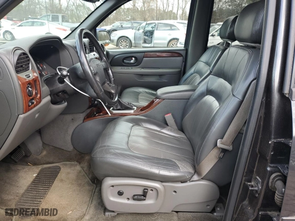 2003 GMC Envoy SLT with VIN 1GKDS13S332326838, listed as a Copart auction lot 48888545 with 197,969 mi miles and Clean Title. Bid and sale history available at carsss.com. Image 7.