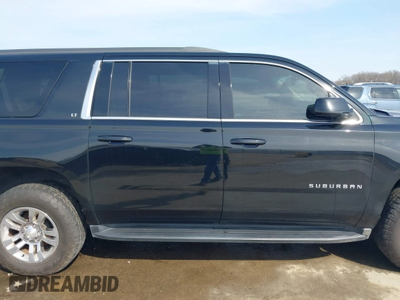 2018 Chevrolet Suburban LT with VIN 1GNSCHKC3JR237396, listed as a IAAI auction lot 41774171 with 205,970 mi miles and . Bid and sale history available at DreamBid. Image 13.