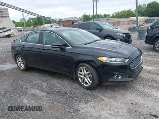 2015 Ford Fusion SE z VIN 3FA6P0HD6FR138153, wystawiony jako IAAI lot #42302619 z przebiegiem 111 504 mil mil oraz . Historia ofert i sprzedaży dostępna na DreamBid. Obrazek 1.