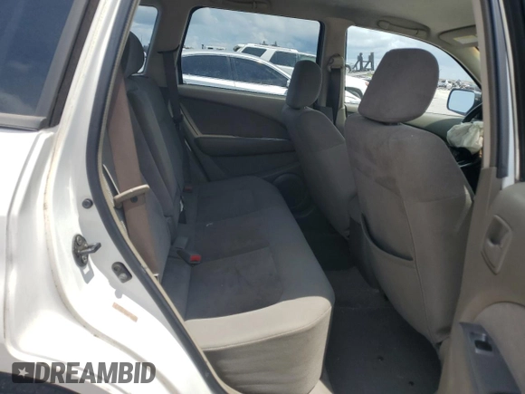 2004 Mitsubishi Outlander LS z VIN JA4LX31F44U047876, wystawiony jako Copart lot #59395585 z przebiegiem 148 726 mil mil oraz Szkoda całkowita • Salvage title. Historia ofert i sprzedaży dostępna na DreamBid. Obrazek 11.