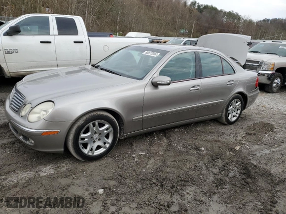 2003 Mercedes-Benz E 320 with VIN WDBUF65J23A297936, listed as a Copart auction lot 80877004 with 214,478 mi miles and Salvage Title. Bid and sale history available at DreamBid. Image 1.