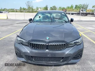 2022 BMW 3 Series 330i with VIN 3MW5R1J0XN8C41168, listed as a IAAI auction lot 42322526 with 44,889 mi miles and . Bid and sale history available at DreamBid. Image 12.