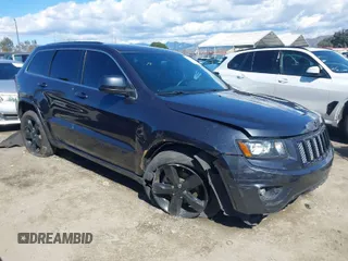 2015 Jeep Grand Cherokee Altitude with VIN 1C4RJEAG6FC920395, listed as a IAAI auction lot 41732665 with 115,699 mi miles. Bid and sale history available at carsss.com. Image 1.