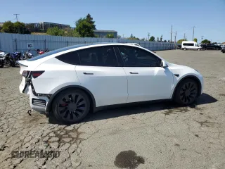 2021 Tesla Model Y Performance z VIN 5YJYGDEF2MF277467, wystawiony jako Copart lot #52410275 z przebiegiem 57 116 mil mil oraz Szkoda całkowita • Salvage title. Historia ofert i sprzedaży dostępna na DreamBid. Obrazek 3.