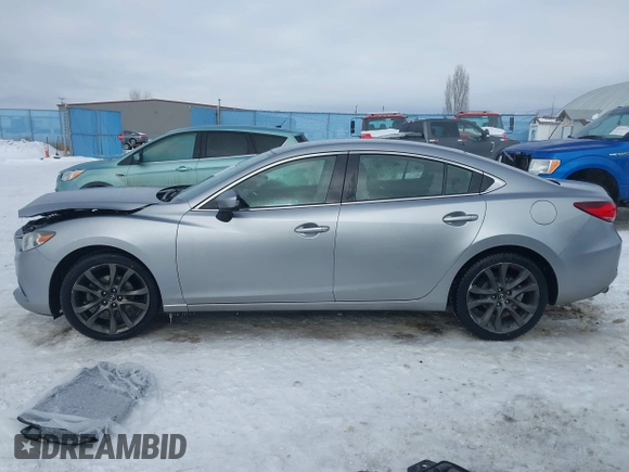 2014 Mazda Mazda6 i Touring with VIN JM1GJ1V62E1134427, listed as a IAAI auction lot 41550411 with 112,804 mi miles. Bid and sale history available at carsss.com. Image 14.
