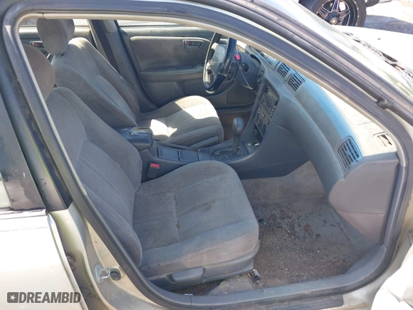 2000 Toyota Camry CE with VIN JT2BG22K0Y0455918, listed as a IAAI auction lot 41878066 with 267,164 mi miles. Bid and sale history available at carsss.com. Image 5.