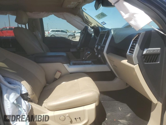 2015 Ford F-150 XLT with VIN 1FTEW1EF8FKD06237, listed as a Copart auction lot 50693145 with 185,609 mi miles and Salvage title. Bid and sale history available at DreamBid. Image 7.