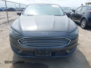 2018 Ford Fusion SE with VIN 3FA6P0HD8JR277127, listed as a IAAI auction lot 42040109 with 118,795 mi miles. Bid and sale history available at carsss.com. Image 6.