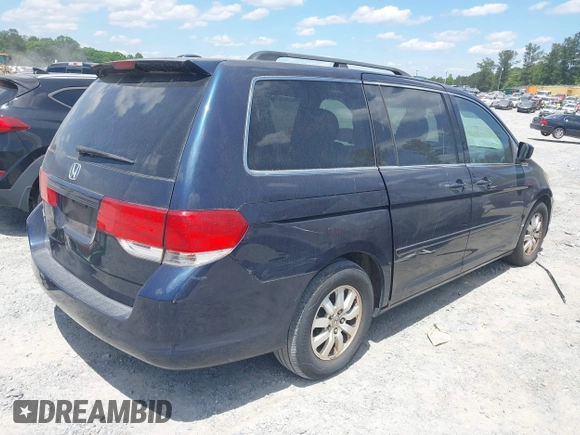 2010 Honda Odyssey EX-L with VIN 5FNRL3H71AB003462, listed as a IAAI auction lot 42200334 with 199,206 mi miles. Bid and sale history available at carsss.com. Image 4.