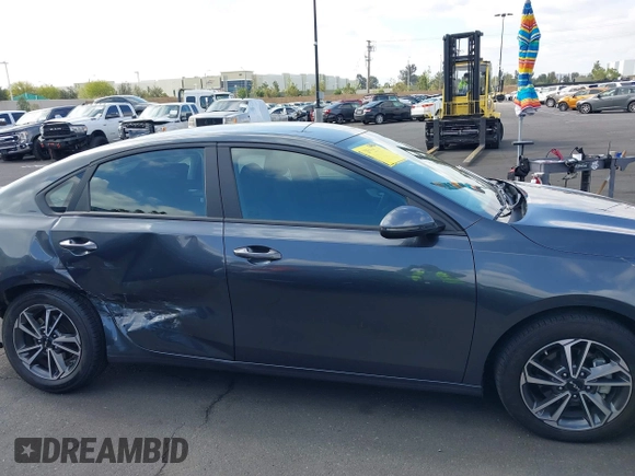 2023 Kia Forte LXS z VIN 3KPF24AD6PE578103, wystawiony jako IAAI lot #42131745 z przebiegiem 42 003 mil mil oraz . Historia ofert i sprzedaży dostępna na DreamBid. Obrazek 13.