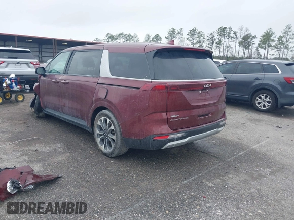 2022 Kia Carnival EX with VIN KNDNC5H36N6097184, listed as a IAAI auction lot 41024289 with 58,722 mi miles and . Bid and sale history available at DreamBid. Image 3.