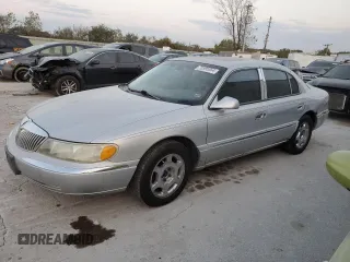 2002 Lincoln Continental with VIN 1LNHM97VX2Y672516, listed as a Copart auction lot 75595354 with 154,361 mi miles and Salvage Title. Bid and sale history available at carsss.com. Image 1.
