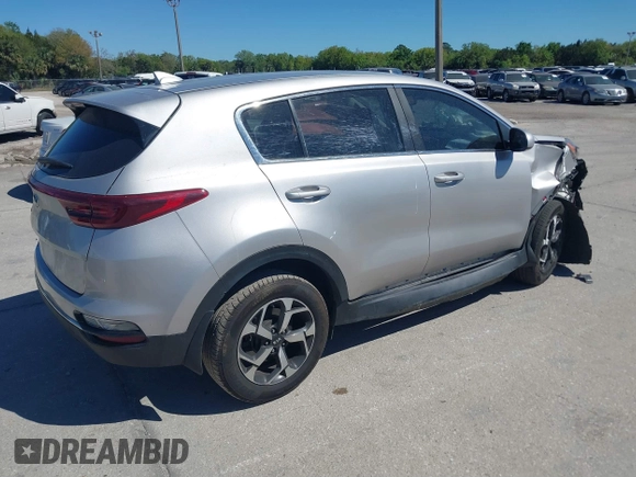 2020 Kia Sportage LX with VIN KNDPMCAC6L7742024, listed as a IAAI auction lot 41826294 with 67,359 mi miles. Bid and sale history available at carsss.com. Image 4.