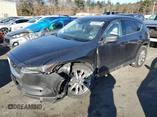 2021 Mazda CX-5 Grand Touring with VIN JM3KFBDM9M0490239, listed as a Copart auction lot 43306975 with 47,010 mi miles and Salvage Title. Bid and sale history available at carsss.com. Image 1.