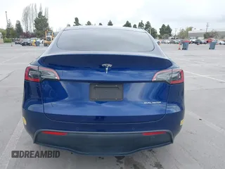 2022 Tesla Model Y Long Range with VIN 7SAYGDEE6NF480146, listed as a IAAI auction lot 41906361 with 31,939 mi miles and . Bid and sale history available at carsss.com. Image 16.