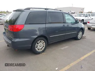 2009 Toyota Sienna XLE with VIN 5TDBK22C19S027059, listed as a IAAI auction lot 42105532 with 241,532 mi miles. Bid and sale history available at carsss.com. Image 4.