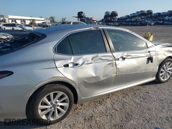 2023 Toyota Camry LE z VIN 4T1C11AK2PU125757, wystawiony jako IAAI lot #42128196 z przebiegiem 5 777 mil mil oraz . Historia ofert i sprzedaży dostępna na DreamBid. Obrazek 6.