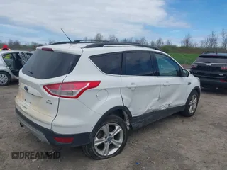 2013 Ford Escape SE with VIN 1FMCU9GX7DUA96986, listed as a IAAI auction lot 42160197 with 193,189 mi miles and . Bid and sale history available at DreamBid. Image 4.