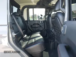 2020 Jeep Gladiator Rubicon with VIN 1C6JJTBG6LL149469, listed as a IAAI auction lot 42224826 with 58,870 mi miles and . Bid and sale history available at DreamBid. Image 8.